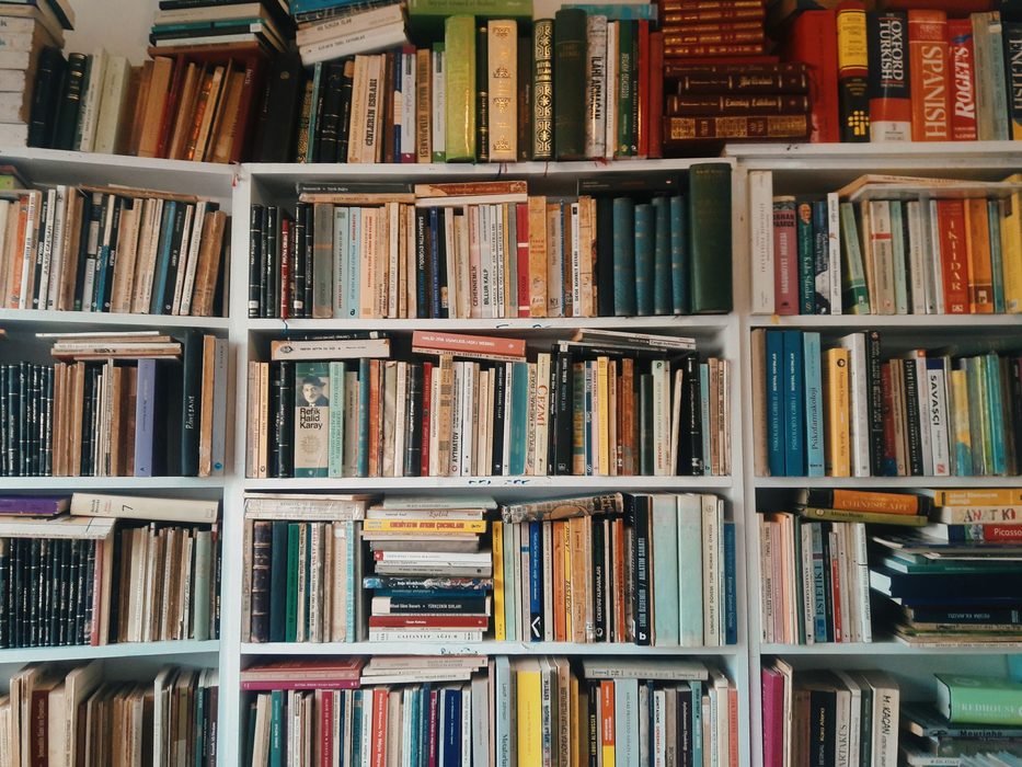 Rows of labelled shelving suggesting an organized repository system